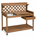 Gartenarbeitstisch 110 x 50 x 140 cm aus Holz Braun mit Ablage und Schublade